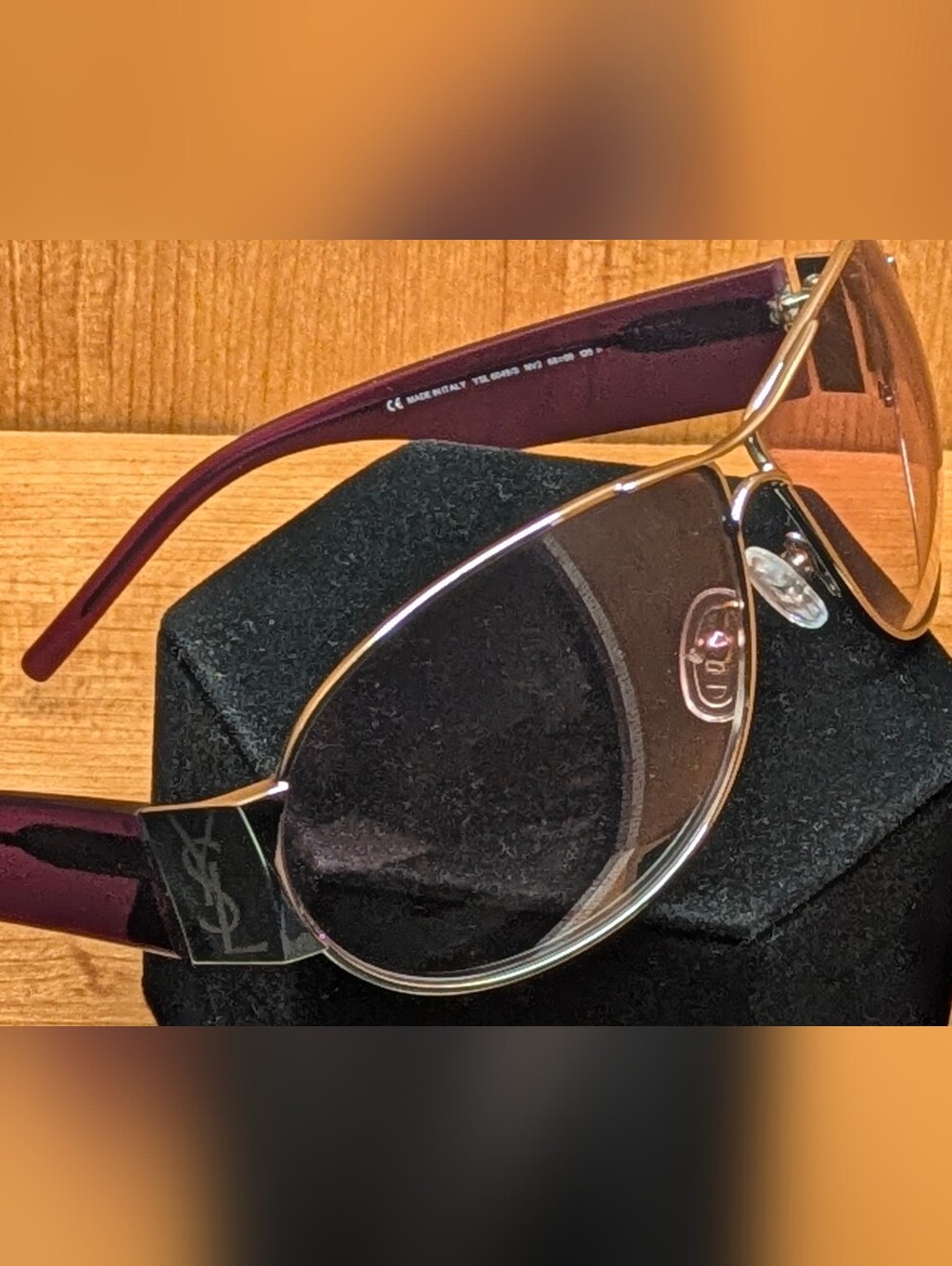 Yves Saint Laurent Gold Frame Sunglasses with Burgundy Temples